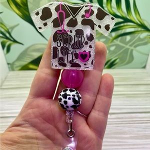 Badge reel and badge buddy